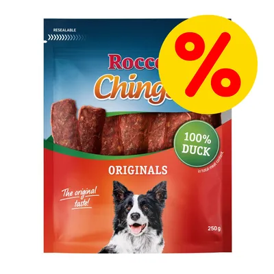 Rocco Chings Originals 100% Duck, 250 g. Tekst: The original taste!, 100% DUCK, ORIGINALS. Stor gul procenttegn badge øverst til højre.