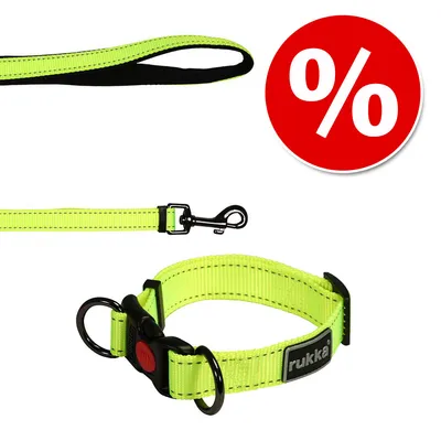 Rukka dog collar and lead in neon yellow with black clasp. Red percent symbol for discount visible.
