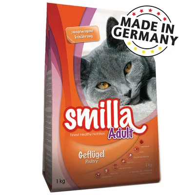 Упаковка корма для кошек smilla Adult Geflügel Poultry 1 кг, надписи: Made in Germany, ausgewogene Ernährung, изображение серой кошки на передней части упаковки.