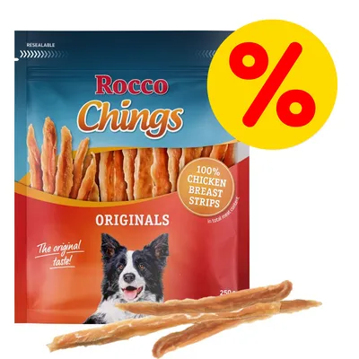 Rocco Chings Originals, 100% chicken breast strips, confezione da 250 g con immagine di cane e simbolo percentuale giallo per offerta promozionale. Testo in inglese sulla confezione.