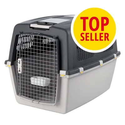 Transportín para mascotas de plástico y rejilla metálica, con etiqueta visible 'TOP SELLER' en amarillo y rojo.