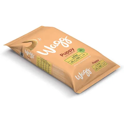 Wagg Puppy food with chicken, rice and oats. Visible feeding guide table on side of pack.