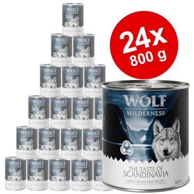 24 dåser Wolf of Wilderness The Taste of Scandinavia hundefoder, hver dåse 800 g. Synlig tekst: 100% grain-free recipe.