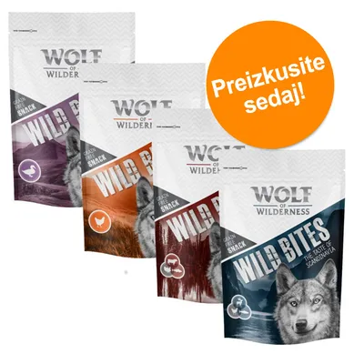 Štiri vrečke Wolf of Wilderness Wild Bites, različni okusi. Na oranžnem krogu besedilo: Preizkusite sedaj! Vidno: Grain Free Snack, The Taste of Scandinavia.