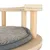 Detailansicht eines runden Holzgestells mit grauem, gepolstertem Kissen. Material: helles Holz und weicher Stoff.