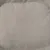 Nahaufnahme eines grauen Stoffmaterials mit feiner Textur, möglicherweise für ein Haustierbett oder Zubehör.