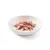 Morceaux de viande rose et blanche dans une assiette blanche, présentés en vue rapprochée sans emballage ni marque visible.