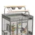Cage pour oiseaux en métal avec perchoirs en bois, deux échelles, deux gamelles en acier inoxydable sur le dessus et accessoires suspendus à l’intérieur.