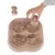 Interactive toy with four compartments and removable elements, hand demonstrating use by removing a part.
