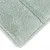 Primer plano de una superficie textil suave de color verde claro con microfibra estructurada.