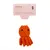 Tiaki Cord Toy, snorlegetøj i orange med sort ansigt. Emballagen viser produktnavn og flersproget beskrivelse.