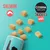 COSMA PURE LOVE SNACKIES MINIS Salmon, kubformade snacks som hälls ur burk. Texten 'SALMON' och en laxsymbol syns tydligt.