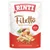 Rinti Filetto Feines Huhnfilet mit Rind in Jelly, sachet de 100 g, morceaux de viande visibles sur l’emballage, texte en allemand et anglais.