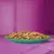 Chunks of moist food served on a green plate, showing texture and portion size for product evaluation.