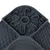Vue rapprochée d’un plateau en plastique gris avec plusieurs zones à motifs : alvéoles, picots et spirales. Aucun texte ou marque visible.