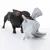 Hund spielt mit einem grossen grauen Stofftier in Tierform.