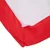 Gros plan sur un coin de coussin ou panier pour animal en tissu rouge et blanc, coutures visibles. Matière textile uniquement, aucun logo ni texte apparent.