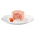 Roze paté met stukjes tomaat op een wit bord, gegarneerd met een halve cherrytomaat.