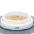 White Catit feeding bowl with grey non-slip mat, filled with dry food.