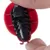 Close-up of a red toy with a black switch labelled 'ON' and 'OFF'.