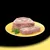 Chunky meat pâté on a yellow plate with a sprig of parsley, shown sliced to display texture. No visible brand or text.