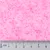 Close-up of pink granules with a centimetre scale, showing particle size and texture.