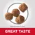 Four round kibble pieces shown with text stating kibble size approximately 0 x 0mm and great taste highlighted below.