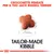 Crocchetta con testo: Crocchette pensate per il tuo Jack Russell Terrier, 1 cm, Tailor-made kibble. Testo in parte in inglese.
