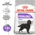 Pachet Royal Canin Sterilised Maxi cu imagine câine, text: Menține greutatea ideală, rezultate dovedite -14% calorii, Care Nutrition. Ambalaj alb cu mov și roșu. Pachet Royal Canin Sterilised Maxi cu imagine câine, text: Menține greutatea ideală, rezultate dovedite -14% calorii, Care Nutrition. Ambalaj alb cu mov și roșu.