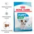 Embalagem Royal Canin Puppy Mini 2–10 months, indicações: sistema imunitário forte, desenvolvimento cerebral, tamanho do croquete adaptado. Número 3 e imagem de croquetes visíveis.