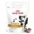 Royal Canin Treats, compatible with Urinary S/O Diets, 230 g. Optimised mineral content. Afbeelding van hond en enkele traktaties zichtbaar op de verpakking.