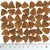 Triangular brown kibble pieces arranged in rows with a ruler below showing each piece is about 2 cm wide, illustrating the size and shape of the product.