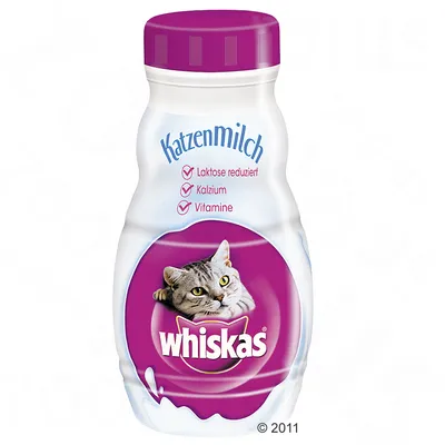 Butelka Whiskas Katzenmilch z wizerunkiem kota, widoczne napisy: 'Laktose reduziert', 'Kalzium', 'Vitamine'. Tekst na opakowaniu w języku niemieckim.