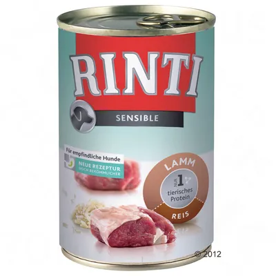 RINTI Sensible Lamm Reis, puszka z widocznym napisem: Für empfindliche Hunde, Neue Rezeptur, Lamm, nr 1 tierisches Protein, Reis. Zdjęcie mięsa i ryżu na etykiecie.