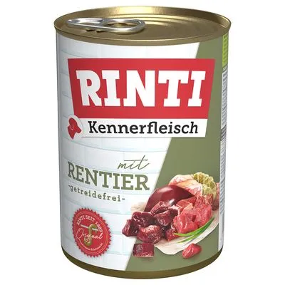 Blik Rinti Kennerfleisch mit Rentier, getreidefrei. Afbeelding van vleesstukken en kruiden op het etiket. Tekst in het Duits zichtbaar.