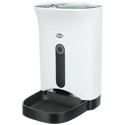 Trixie automatic pet feeder in white with black food tray and transparent lid, visible Trixie brand name on front