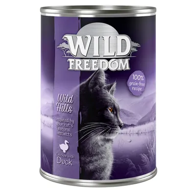 Wild Freedom Wild Hills cat food tin, visible text: 100% grain-free recipe, Inspired by your cat's natural instincts, Chicken with Duck