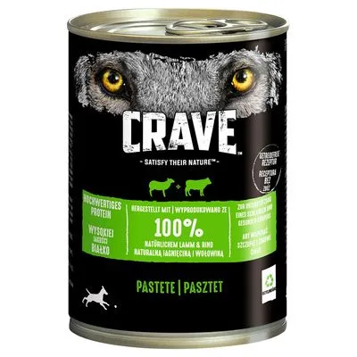 Blik Crave natvoer, tekst: 'Satisfy their nature', 100% natuurlijk lam & rund, hoogwaardige eiwitten, pastete. Bevat afbeelding van schaap en koe. Meertalige informatie zichtbaar.