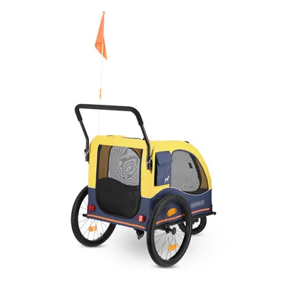 Yellow and blue bicycle trailer with mesh windows, two large wheels, handle and orange flag. Side inscription 'Hafenbanane'.