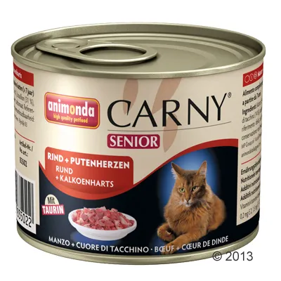 animonda CARNY SENIOR kattenvoer, rund en kalkoenharten, met taurine. Afbeelding van een kat en een kom vlees op het blik zichtbaar.
