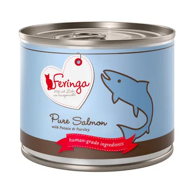 Feringa Pure Salmon with Potato & Parsley, human-grade ingredients. Blå konservburk med fiskillustration och hjärta med texten 'Mit viel Liebe wie hausgemacht!'.