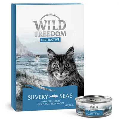 Wild Freedom Instinctive Silvery Seas kattenvoer, 6 x 70 g. Met verse vis, 100% graanvrij recept. Verpakking en blikje met afbeelding van kat en zee.