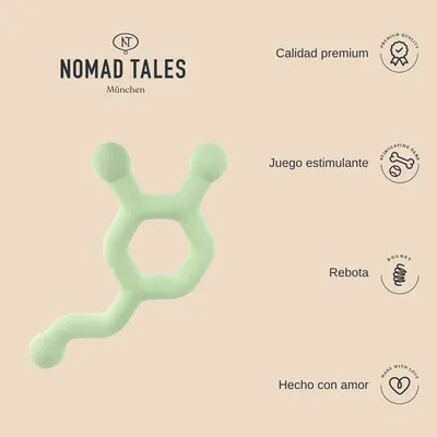 Juguete verde Nomad Tales München. Texto visible: Calidad premium, Juego estimulante, Rebota, Hecho con amor.