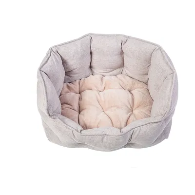 Round, padded pet bed made of grey fabric with soft beige interior surface.