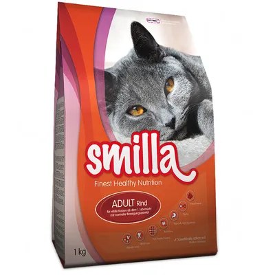 Smilla Finest Healthy Nutrition ADULT Rind kattenvoer, 1 kg verpakking met afbeelding van grijze kat. Tekst: voor vitale katten vanaf 1 jaar met normale bewegingsactiviteit.