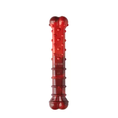 Hueso masticable Nylabone rojo con superficie con protuberancias y logotipo en relieve 'Nylabone'.