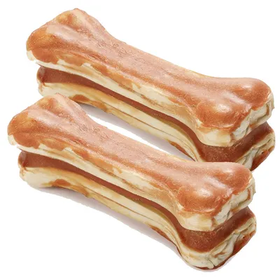 Two brown and white bone-shaped dog chews with layered texture, shown side by side on a white background. No visible branding or text.