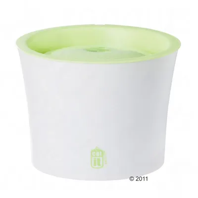 Fontaine à eau Catit, plastique blanc et vert clair, logo Catit visible sur le devant. Modèle 2011 indiqué en bas à droite.