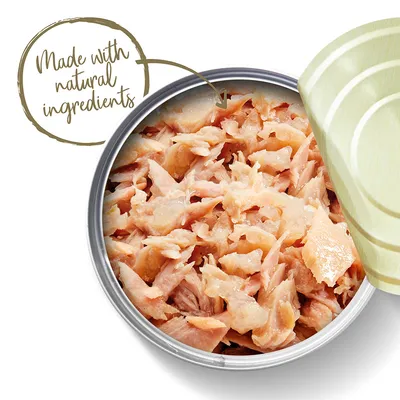 Avoin metallipurkki, jossa vaaleanruskeaa lihaa. Teksti: Made with natural ingredients.