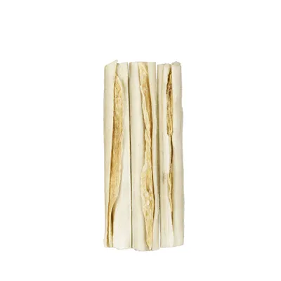 Four white chew sticks with a visible filling, arranged side by side on a plain background.